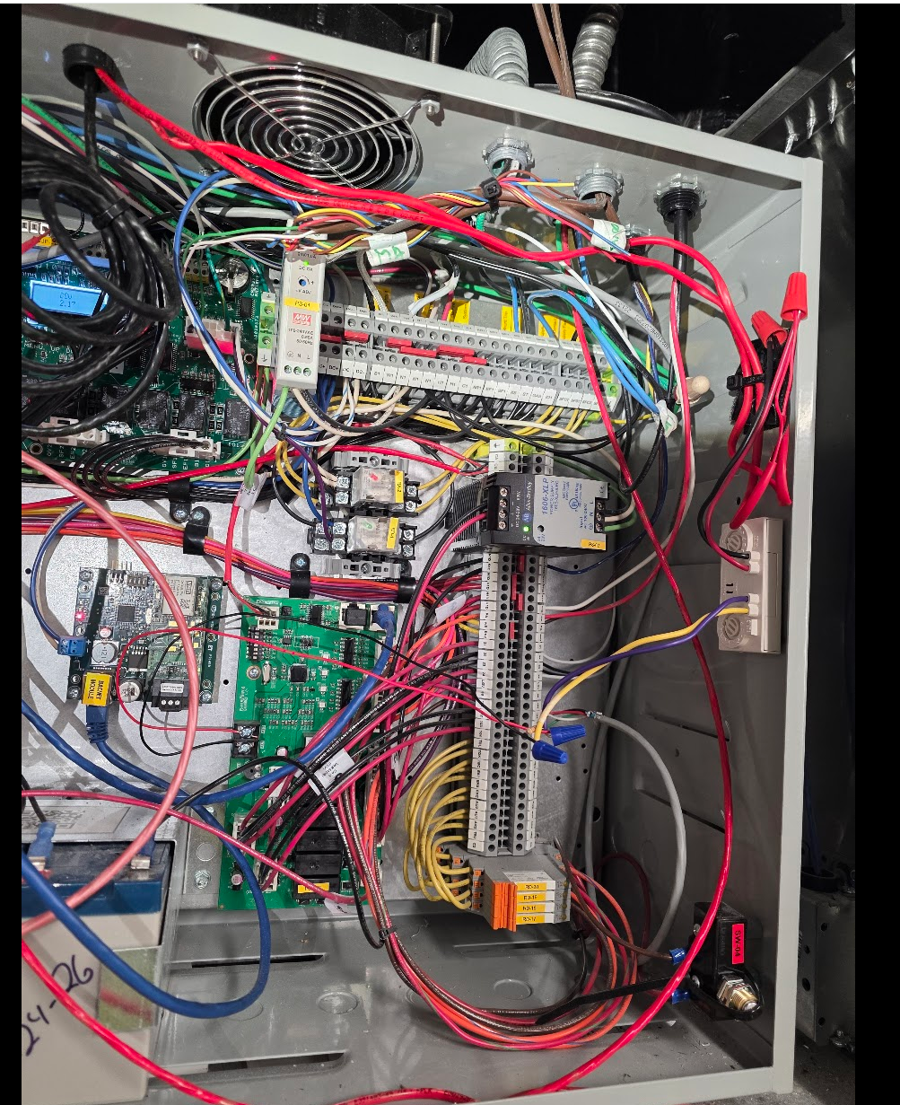 Installed low-voltage control panel with organized field wiring